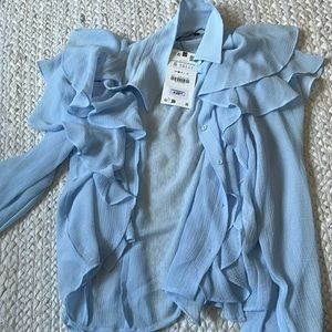 Never worn! Zara light blue ruffle blouse